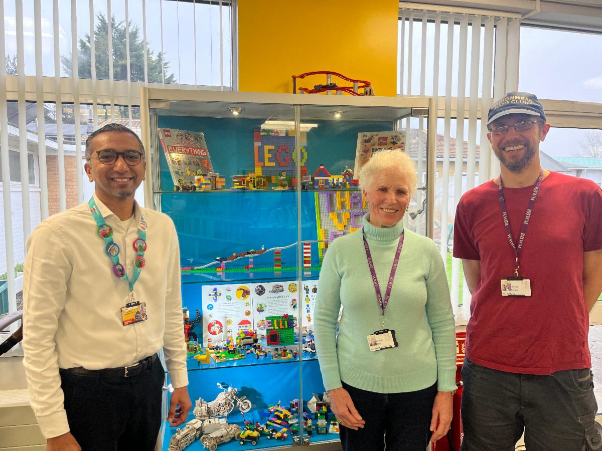 Royal Borough Councilllors Jack Douglas and Helen Prince and with Ramesh Ganeson, Vice President of LEGOLAND Windsor Resort at Dedworth Library